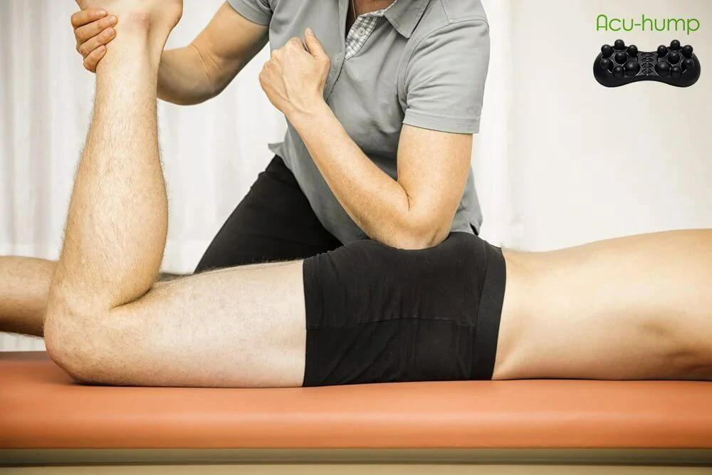 Therapist uses elbow to press trigger points on hip to relieve tight piriformis muscle