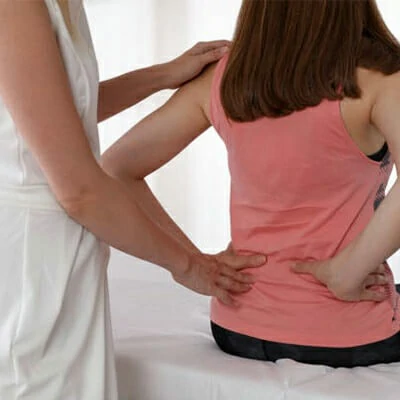 https://www.acuhump.com/wp-content/uploads/2023/07/Doctor-and-patient-with-lower-back-pain.webp