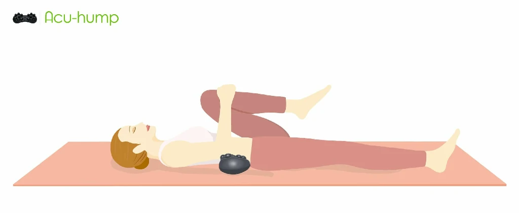 a women stretching psoas hip flexors with Acu-hump relieve scaitica lower back pain